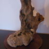 Bois sculpté sur pierre naturelle