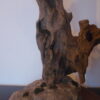 Bois sculpté sur pierre naturelle