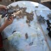 tableau en matériaux recyclés "en cours de création"
