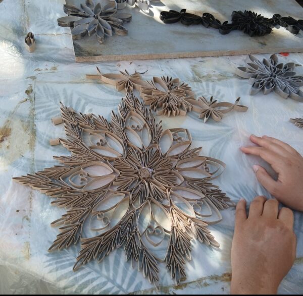 tableau en matériaux recyclés "en cours de création"